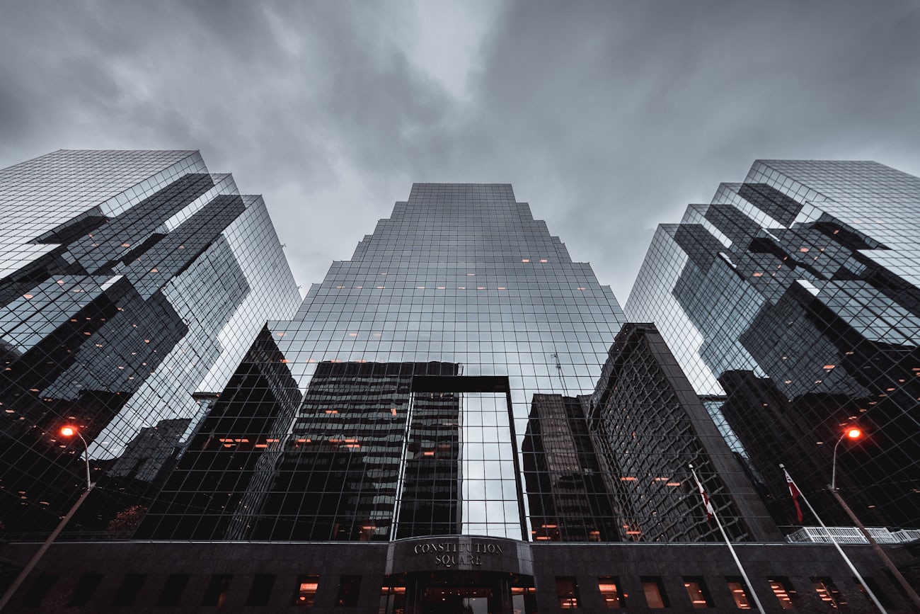 Dramatic monochrome towers converging toward the sky